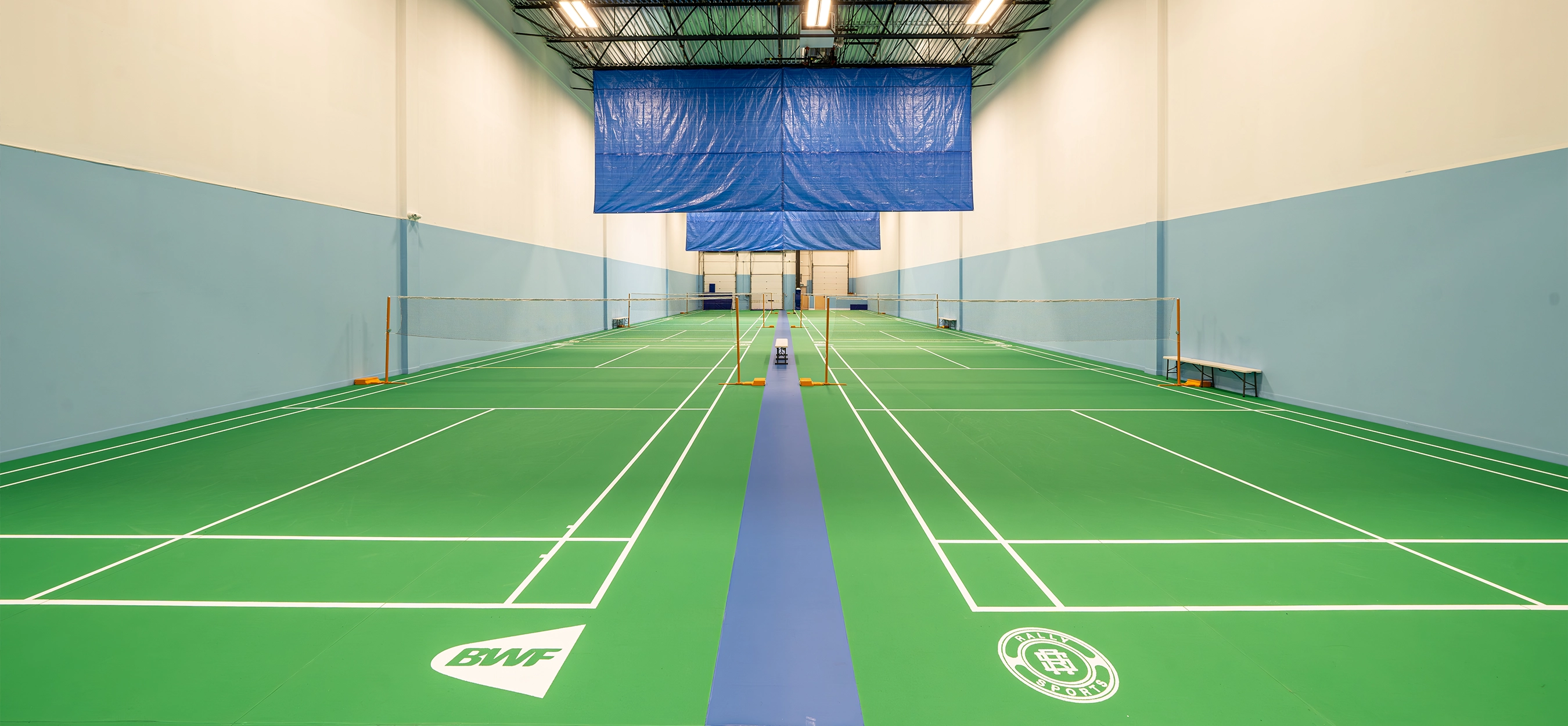Indoor Badminton Court by Rally Sports Club